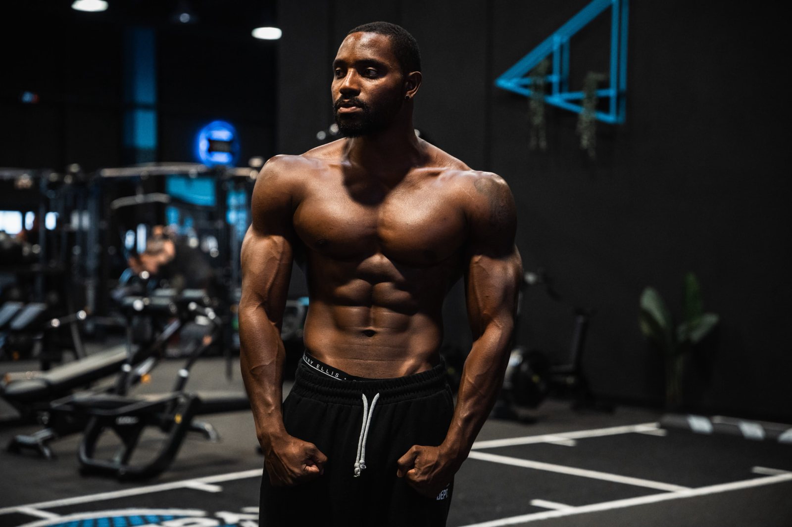 Martel Metellus photographed in a dark industrial studio